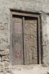 geschnitzte Türe eines Handelshaus in Mirbat