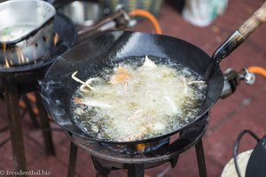 Es brodelt im Wok in Chinatown von Bangkok