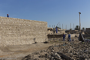 Gastarbeiter an der Arbeit beim Heritage Center